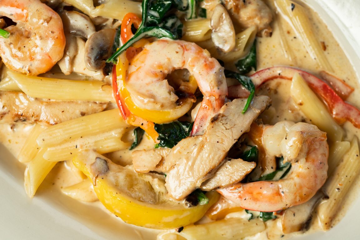 Penne with shrimp, chicken and spinach in cream sauce at Antonio's Italian Grill
