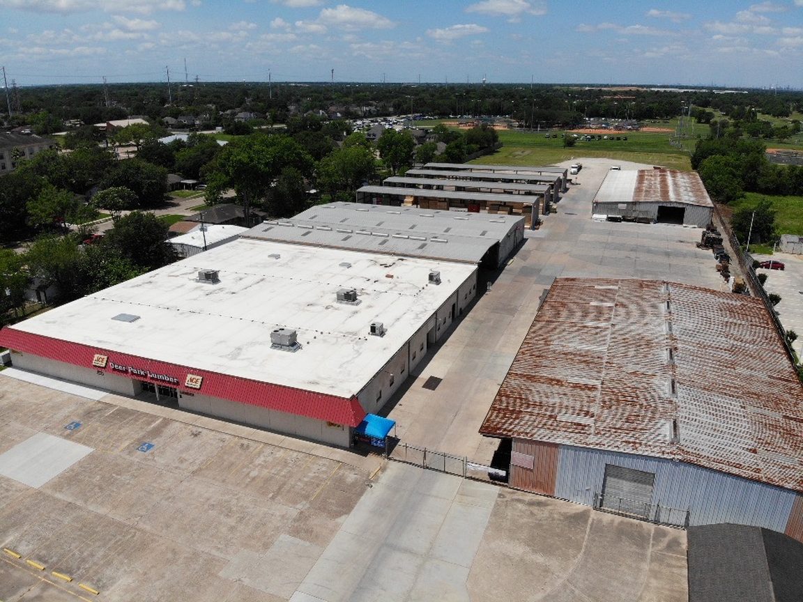 Aerial view of Deer Park Lumber Co. on Center Street with its lumber sheds