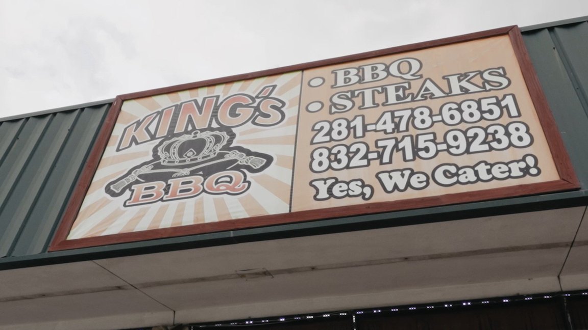 The King's BBQ sign under a green metal awning on Underwood Road